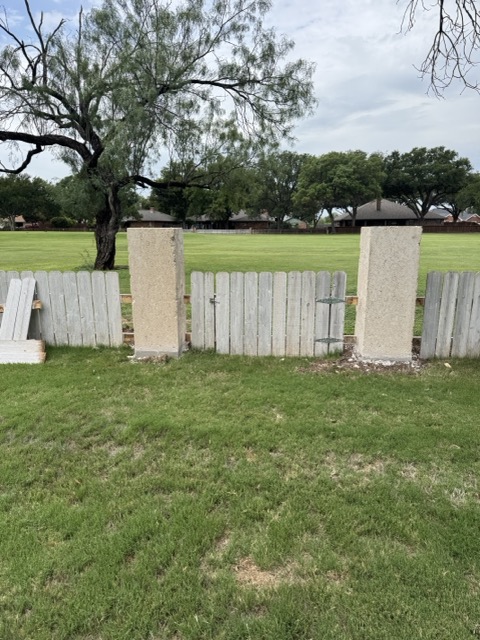 New concrete gate columns set into a fence line in San Angelo, TX