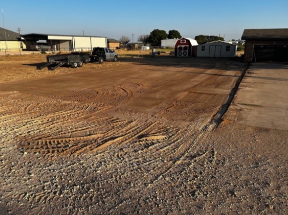 Compacted graded yard for equipment staging