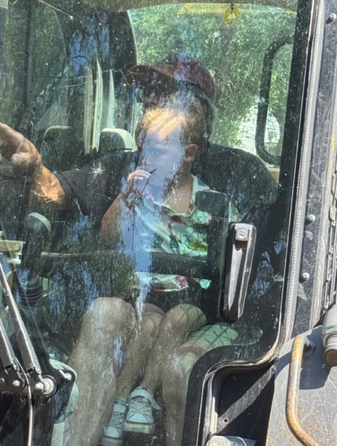 Equipment operator in cab on a job site in Big Lake, TX