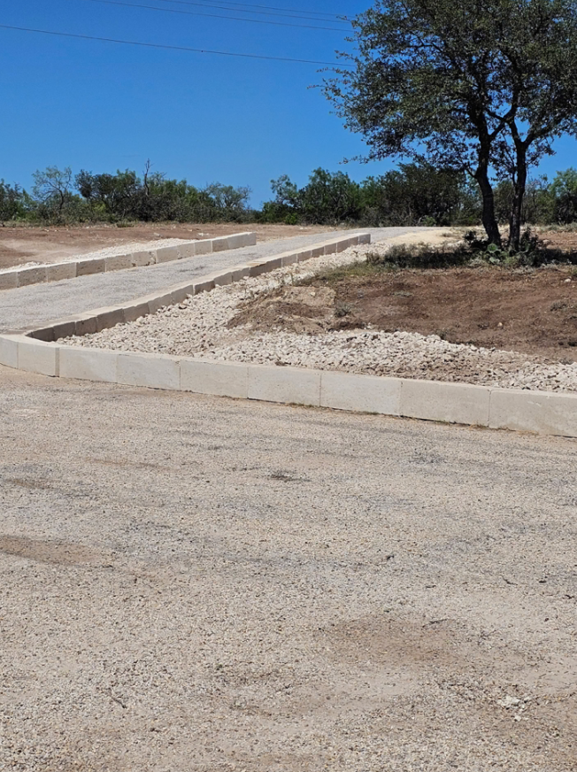 Finished driveway with retaining walls